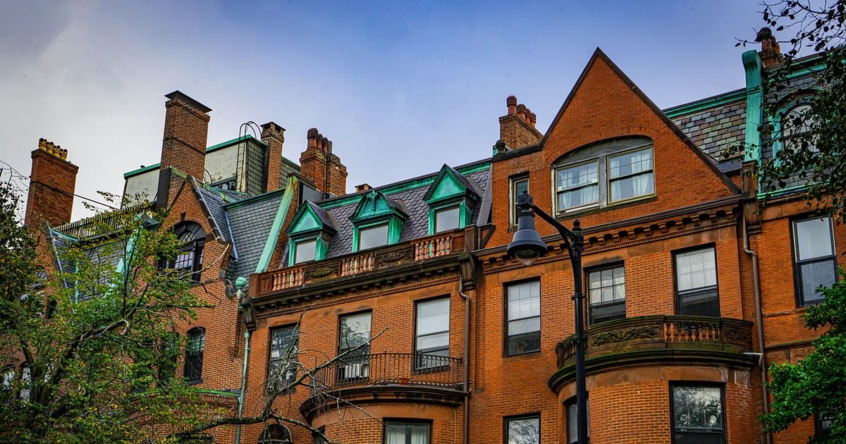 A detailed view of historic brick buildings with classic architectural elements in Boston, Massachusetts.